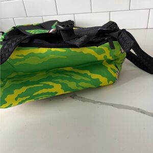 Sprayground Green and Yellow Camouflage Backpack ren and stimpy. Brand new